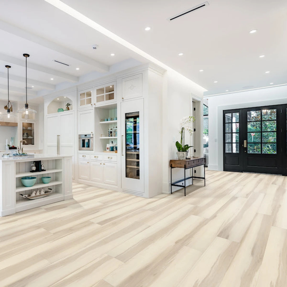 Prime in Sandford Oak SPC Rigid-Core Plank installed in a room setting